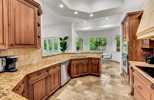 Bay Isle House | Luxurious Paradise with Tiki Bar and Heated Pool, Just Remodeled!