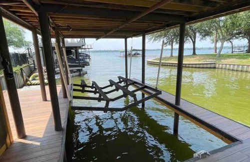 Carolyn Estates House | Luxurious, Tranquil, 4BR Lakefront Villa