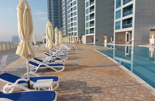 Rumailah Apartment | Luxury 1 BR Beach Apartment with Full Sea View