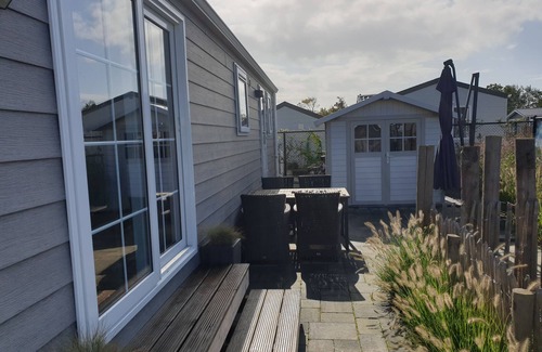 Renesse Ski Chalet | Luxury 4pers chalet, only 318 STEPS TO THE BEACH, fully enclosed garden.