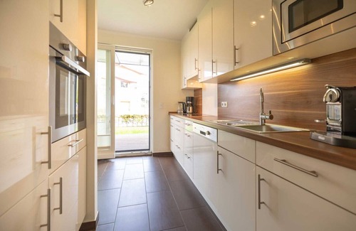 Ostseebad Baabe Apartment | Luxury apartment with sauna, corner bath, fireplace, wireless, beach chair on patio