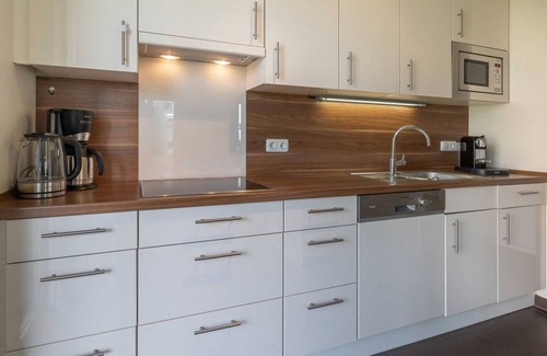 Ostseebad Baabe Apartment | Luxury apartment with sauna, corner bath, fireplace, wireless, beach chair on patio