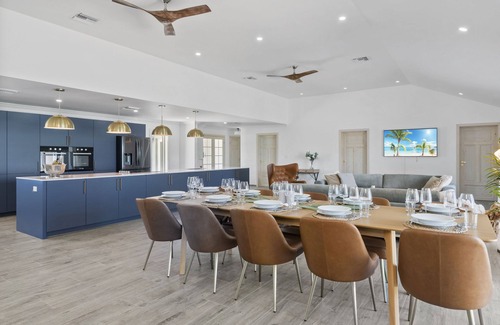 Hartswell Villa | Luxury beachfront villa with dock and a private large heated pool. For 10 people