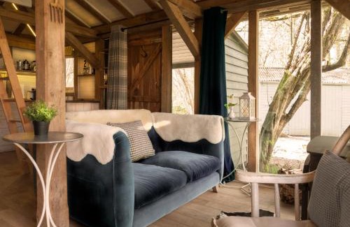 Billingshurst House | Luxury Boltholes cabin in the woods with hot tub