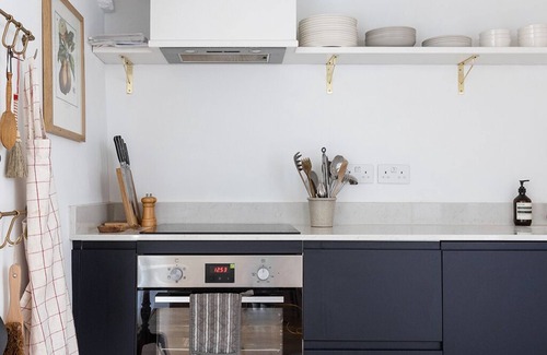 Inchbrook Cottage | Luxury Cotswold cottage with valley views and stylish interiors.