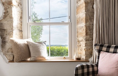 Inchbrook Cottage | Luxury Cotswold cottage with valley views and stylish interiors.