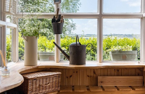 Inchbrook Cottage | Luxury Cotswold cottage with valley views and stylish interiors.