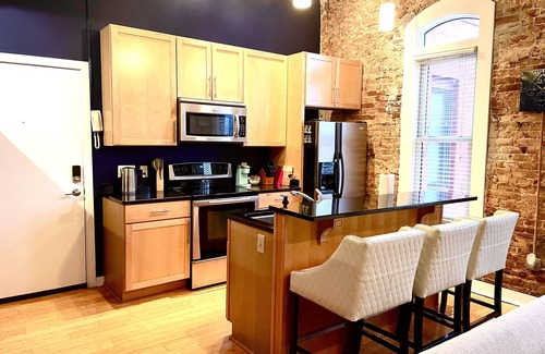 Jonesboro Condo | Luxury Downtown JB Condo-Designated Parking!