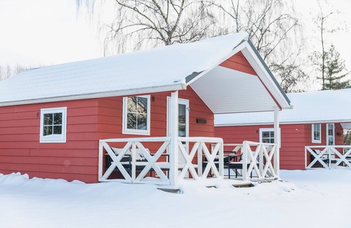 Zuna Cabin | Luxury glamping is done in this colorful Scandinavian lodge.