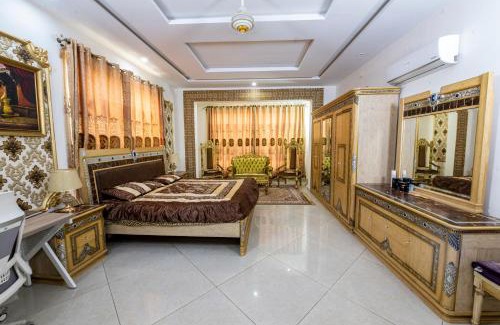 Hassan Abdal House | Luxury Hotel Near Islamabad Airport- BBQ, Pool, Waterfall, Gazebose