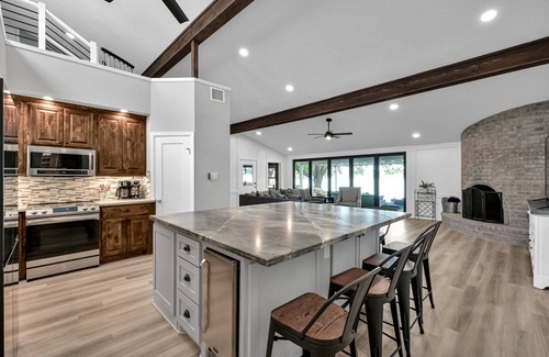 Willis House | Luxury Lakefront Home with Pool, Private Dock, Game Room, Putting Green & Outdoor Oasis!