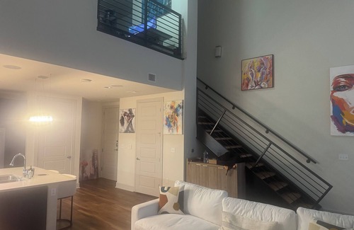 Market District Apartment | Luxury Loft Penthouse in the Heart of the City with Skyline Views – 1BR, 1.5BA