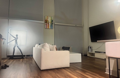 Market District Apartment | Luxury Loft Penthouse in the Heart of the City with Skyline Views – 1BR, 1.5BA