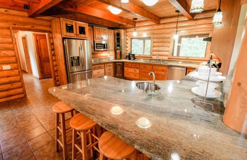 Whitefish House | Luxury Log Home: 2 King Suites, HOT TUB, Fire Pit near Skiing + ALL Winter Fun