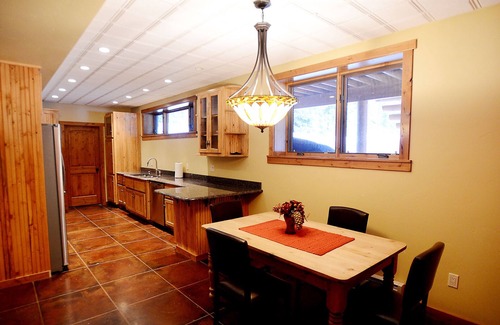 Whitefish House | Luxury Log Home: 2 King Suites, HOT TUB, Fire Pit near Skiing + ALL Winter Fun