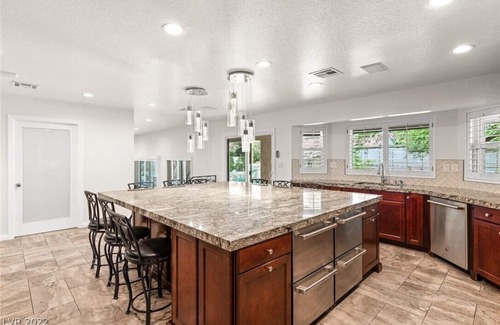 Las Vegas House | Luxury Mediterranean Estate w/Lagoon Pool & Waterslide, 9BR, 8BA, & Game room