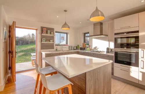 Holworth House | Luxury property with spa access on a nature reserve Cheetah Retreat BV18