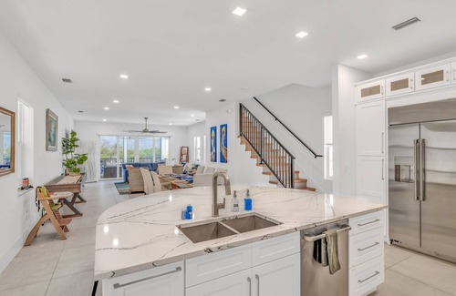 Marathon House | Luxury Retreat w/Pool, Spa, 100’ Dock, Games & More!