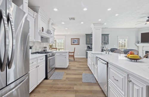 Moss Bluff House | Luxury riverfront home w/pool, fishing dock, & boat house w/lift ! Sleeps 14