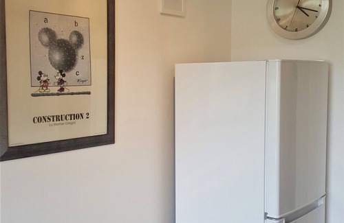 Brabrand Condo | M H Homes Apartments with a fully equipped kitchen.