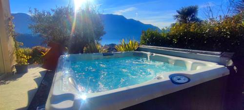 Tremezzina Apartment | Magic Garden with Jacuzzi-Pool and Luxury Lake Como view
