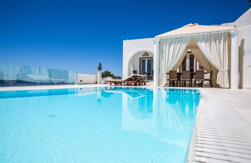 Firostefani Villa | Magnificent Santorini Villa | 3 Bedrooms | Villa Bacchus | Private heated pool.