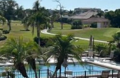 Burnt Store Marina Condo | Main Floor Condo With Lanai Looking On To Golf Course