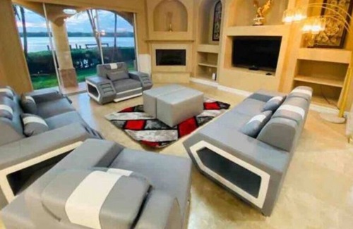 Cocoa Beach Villa | Majestic Waterfront Mansion in Cocoa Beach and Sunset Cove| Private dock and Pool