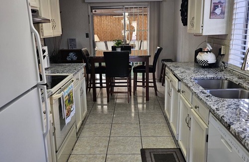 Maryvale Village House | Make The Palm Home your home and the best pleasant stay with awesome amenities