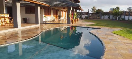 Guajiru House | Mansão Guajiru Suítes