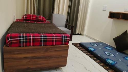 Mayapur Apartment | Mansa Apartments by UV Stays