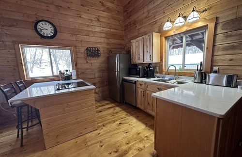 Ferryville Cabin | Maplewood Cabin: Secluded Romance with Private Hot Tub while Star Gazing.