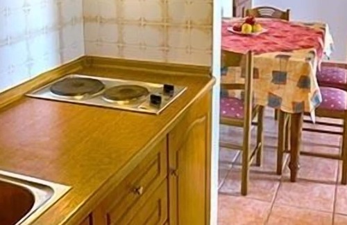 Agios Georgios Pagon Apartment | Maria's apartment 1 - right on the beach with sea views in the beautiful bay of Agios Georgios Pago