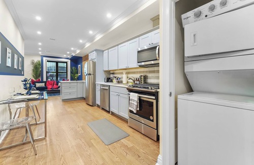 Upper Manhattan Apartment | Marvelous 6-bedroom apartment with Chef's Kitchen and Backyard Access in NYC