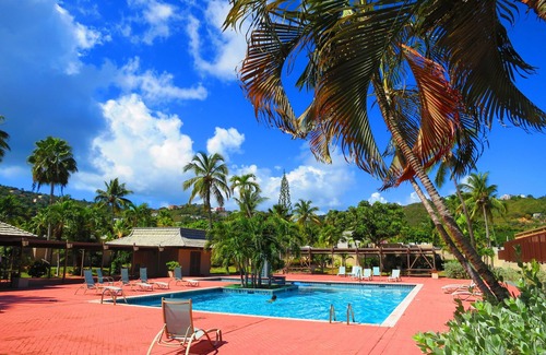 Frydendal Villa | Master Garden Bedroom adjacent to Margaritaville. 50m To The Beach