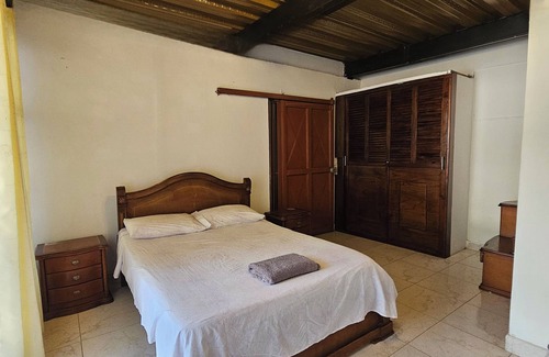 Garzon Bed & Breakfast | Matrimonial Suite - Exclusive area with hammock in front of the Swimming Pool