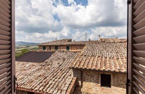 Compignano Apartment | Medieval village TOP flat, third floor with Wi-Fi & aircon
