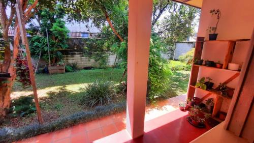 Bacacheri House | Memora Guesthouse Curitiba - Quartos em Casa próximo ao Parque Bacacheri