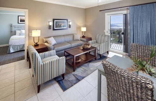 Beachside Village Resort | Memorial Weekend near the seawall with private beach access.