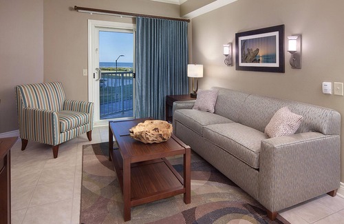 Beachside Village Resort | Memorial Weekend near the seawall with private beach access.