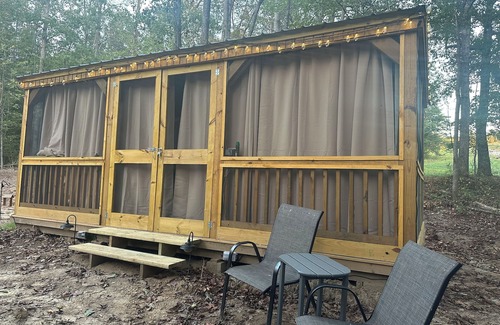 Mentone RV Rental | Mentone glamping getaway in a private screened in cabin in charming Mentone