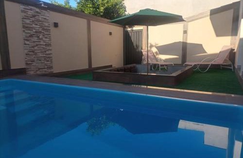 Palmeiras House | Meu cantinho com ar e piscina