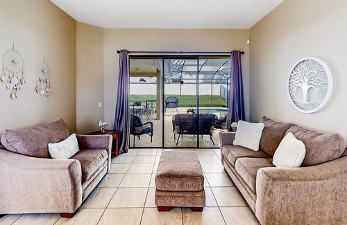 Legacy Park House | Mickey's Hideaway | Spacious house in Davenport with pool & children's items