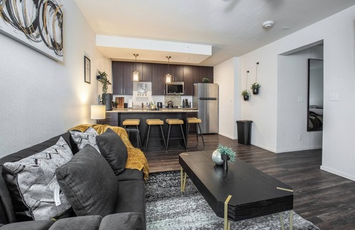Overland Park Apartment | Mid-Rise Luxury 1 BR 1 BD Free Carport Parking WiFi and Dedicated Workspace