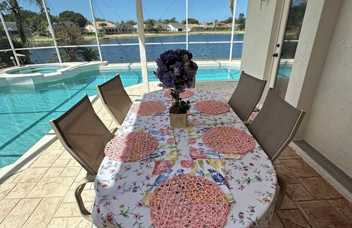 Naples House | Million dollar lake views; 4-bed 3 bath pool house- Old World Charm in Naples FL