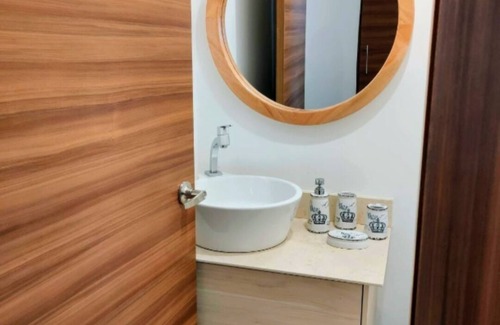 Conocoto Apartment | Minimalist suite with volcano view
