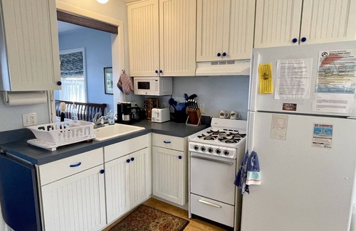 Ocracoke House | Minnow: Waterfront efficiency cottage, hot tub, private sandy beach.
