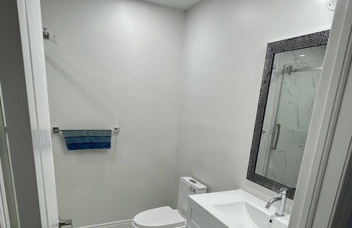 Woodslee House | Modern 1BR Basement Retreat