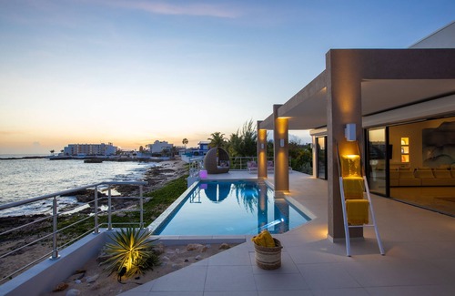 Beacon Hill Villa | Modern 4 bedroom villa with swimming pool offering magnificent sea views