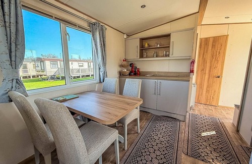 Hunstanton House | Modern 6 berth caravan with front decking at Manor Park, Hunstanton ref 23015T